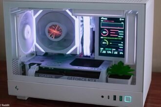 This tiny white gaming PC is simply stunning, and it even contains two screens