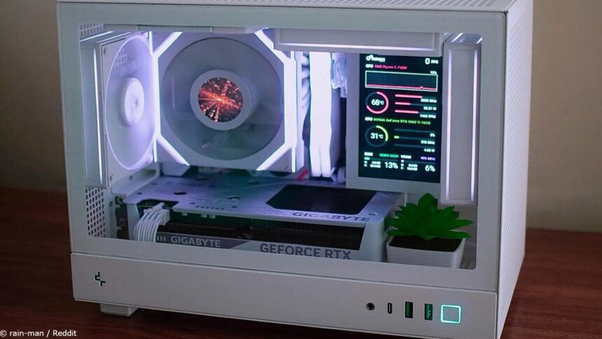 This tiny white gaming PC is simply stunning, and it even contains two screens