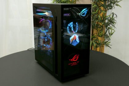 Asus' colossal new gaming PC has a two-inch-thick door, holographic fans, and a hood scoop