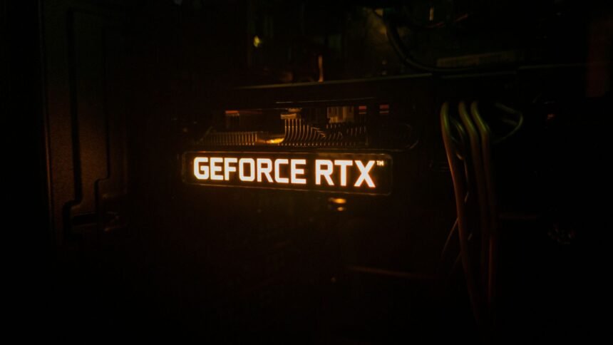 GeForce RTX backlighting on a graphics card lighting up in a dark room