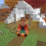 Minecraft Snapshot 9: a person made from blocks sits inder a tent in the woods.